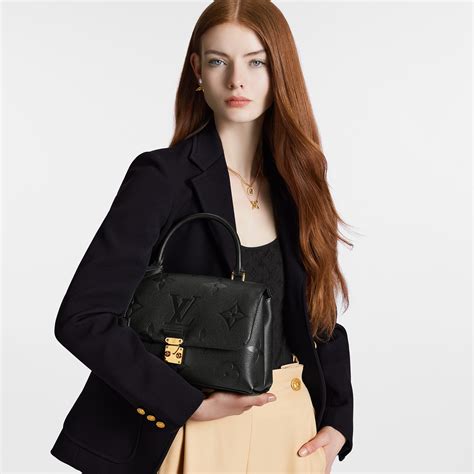 madeleine monogram empreinte leather handbags